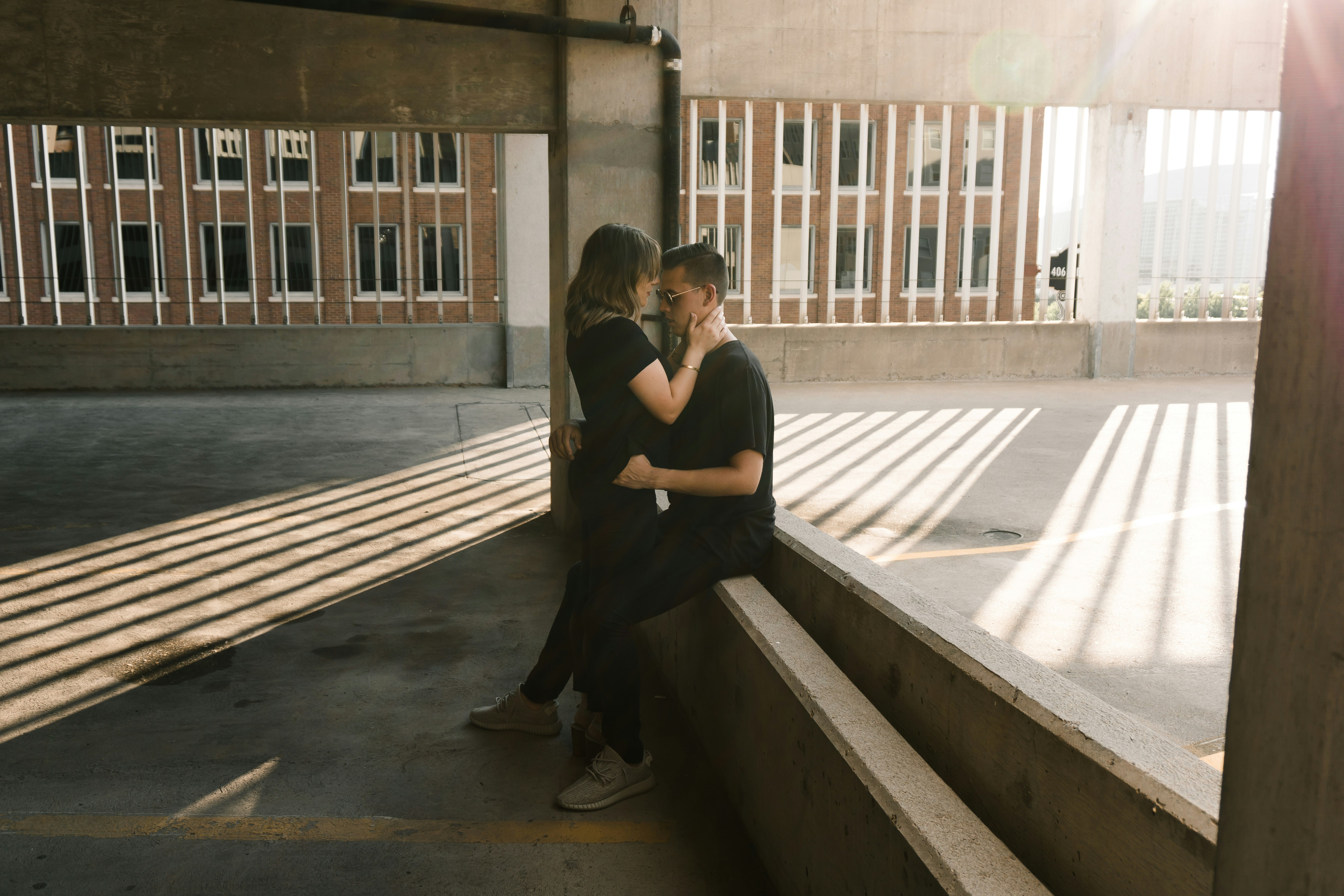 man and woman hugging each other